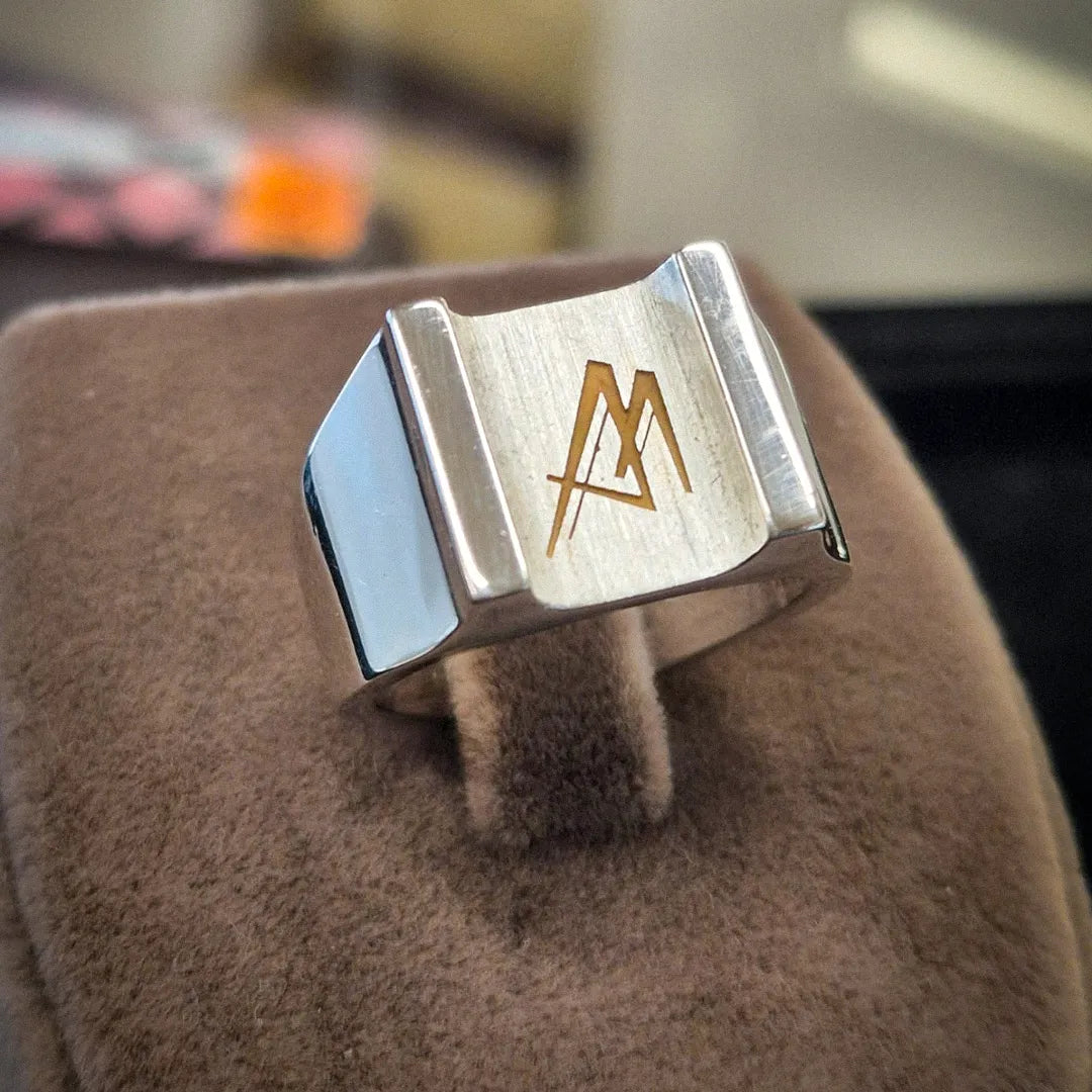 Mantor 25 limited silver signet ring with engraved Mantor logo on brushed top
